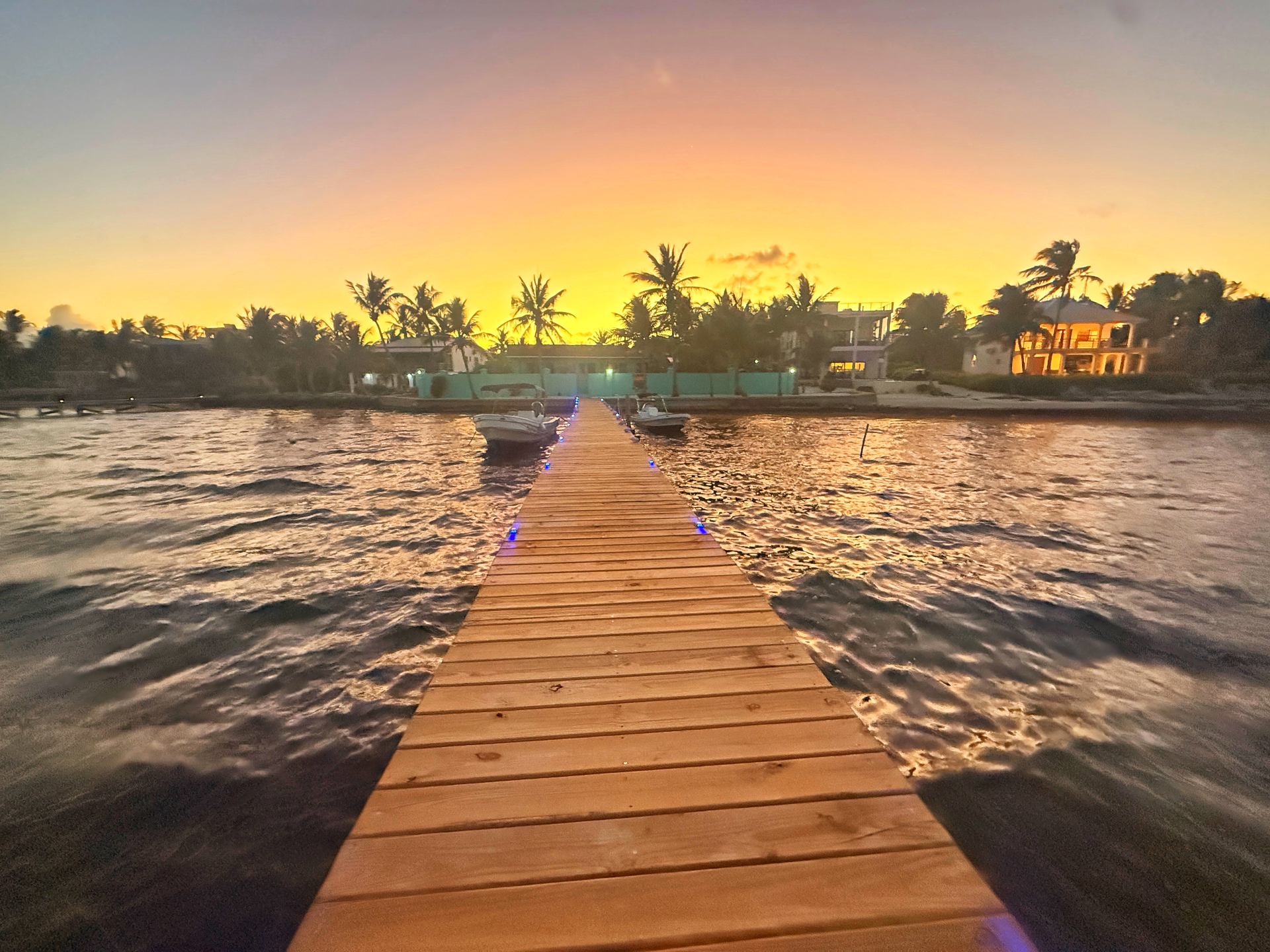 Dusk over the private dock at Playa Blanca, San Pedro, Belize